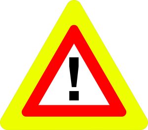 Ceļa zīme – Nr. 142F Bīstami (ar fluorescējošu apmali)